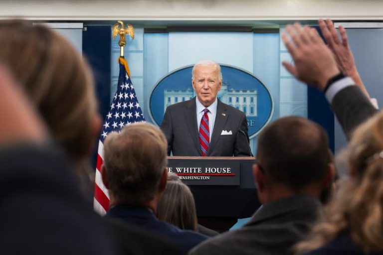 In surprise visit with reporters, Biden shares concerns about election violence