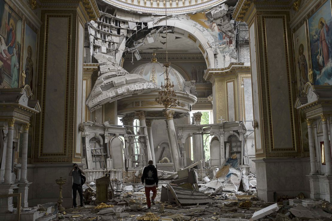 Church personnel inspect damage inside the Odesa Transfiguration Cathedral in Odesa, Ukraine, on July 23, 2023.