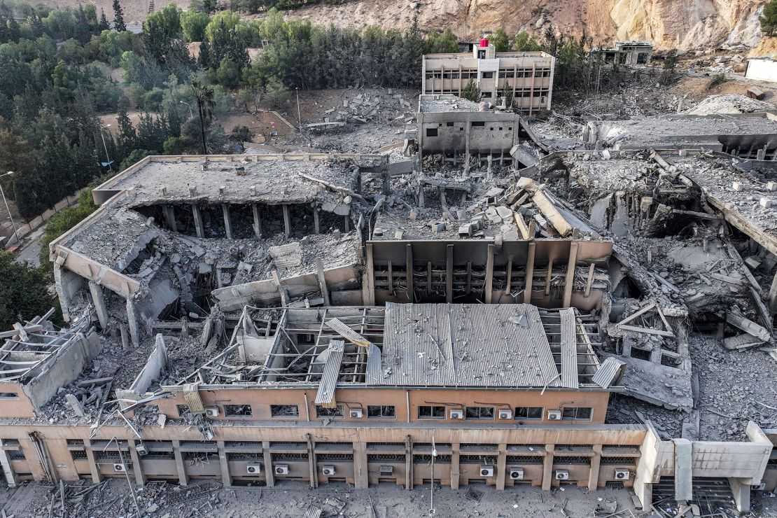 This aerial view shows the aftermath of an overnight strike attributed to Israel on the Barzeh scientific research center affiliated with the Syrian defence ministry in northern Damascus on December 10.